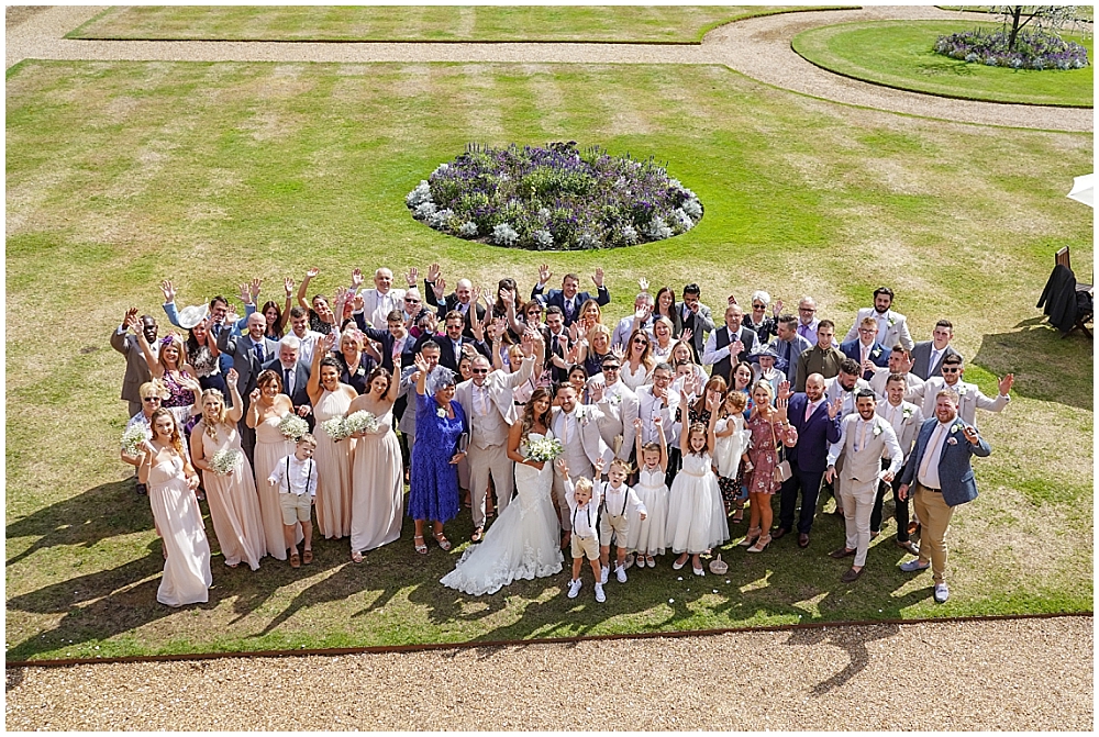Big group photo taken on the lawn at The Elevethem Hotel in Hampshire