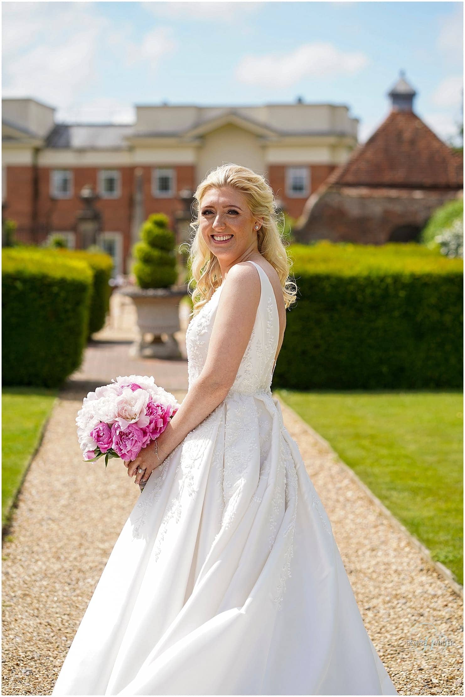 Bride on her wedding day at the Four Seasons Hotel in Hampshire